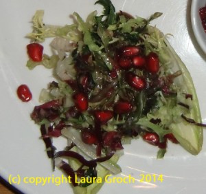 pomegranate seeds on salad